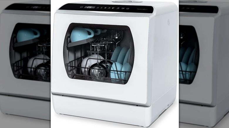 Hermitlux countertop dishwasher with glass door.