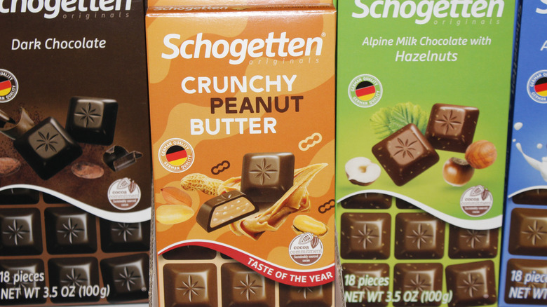 Bars of Schogetten chocolate lined up in colorful packaging