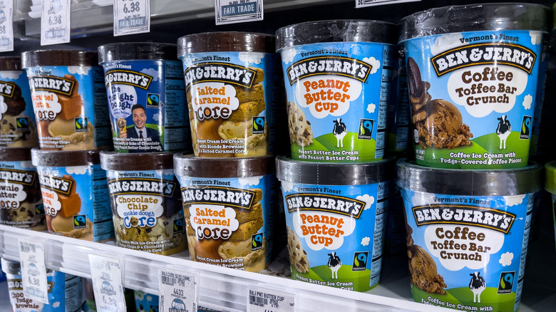 Ben and Jerry's brand ice cream containers for sale at a local supermarket aisle.