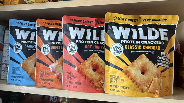 A row of four flavors of Wilde Protein Crackers