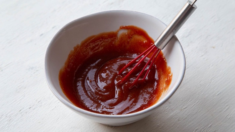 Ketchup and small whisk in bowl