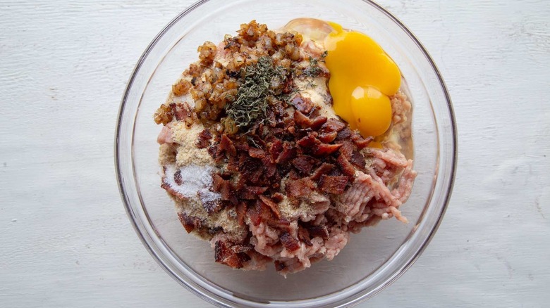 Various turkey meatloaf ingredients in bowl