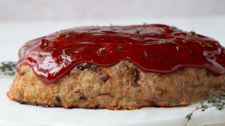 Meatloaf with ketchup glaze and herbs