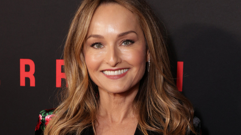 Giada De Laurentiis smiles in a floral top at an event