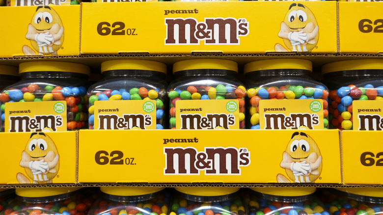 Packages of Peanut M&M'ss chocolate candy displayed at a Costco Wholesale store