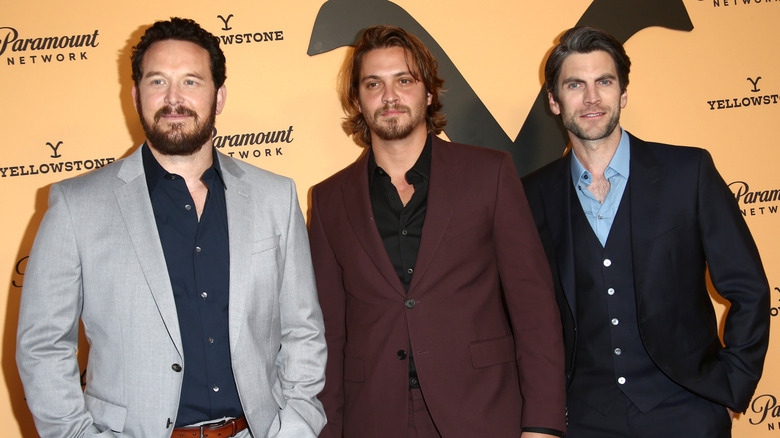 Cole Hauser, Luke Grimes, and Wes Bentley on step and repeat