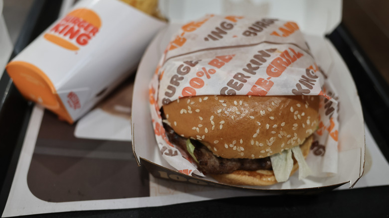 A Burger King burger and fries on a tray