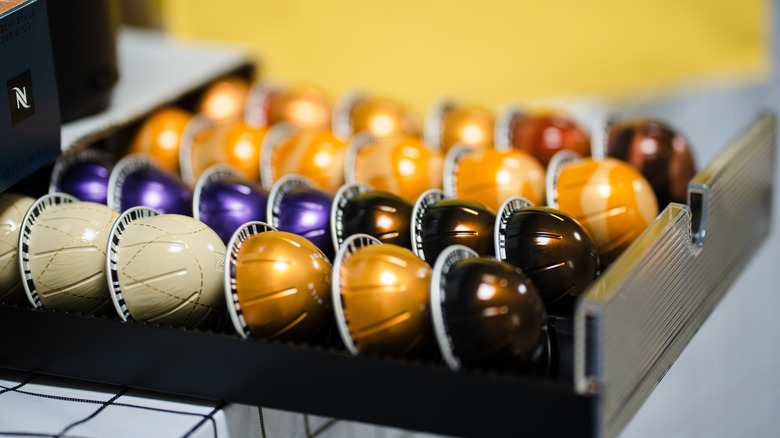 A variety of Nespresso pods in a drawer
