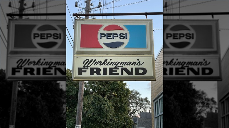 The Workingman's Friend exterior sign with old-fashioned Pepsi logo on top