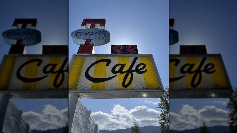 The vintage exterior sign for Twede's "RR" Cafe against a blue sky