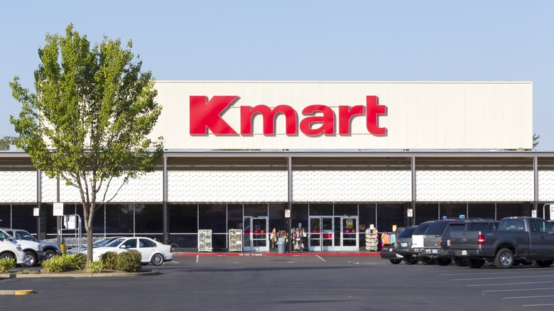 Kmart store front with cars in parking lot