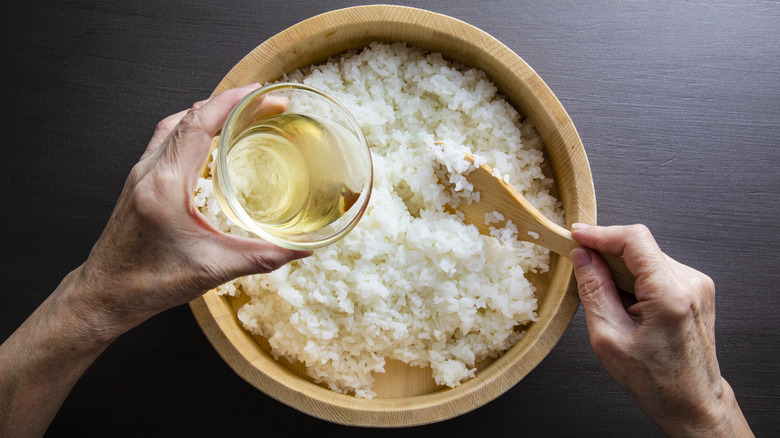 Making sushi rice in a hangiri.