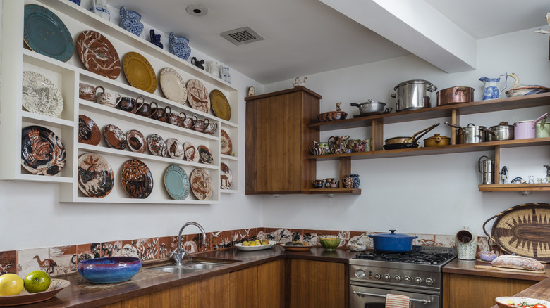 Beautiful serveware arrange and organized in the kitchen