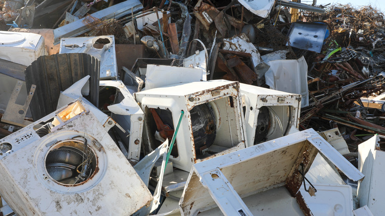A large recycling scrapyard with broken down appliances