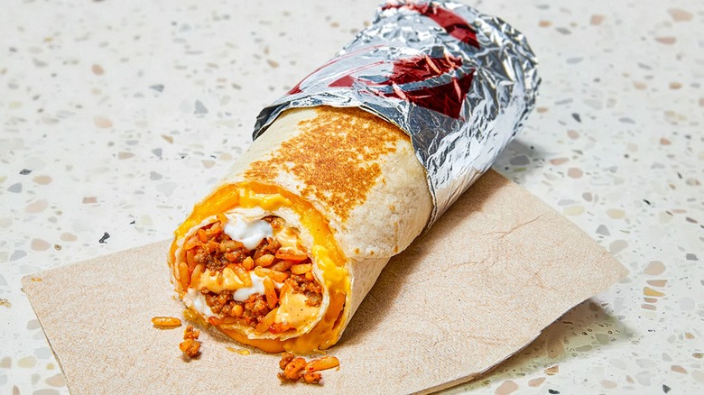 Taco Bell's Quesarito wrapped in foil on paper napkin