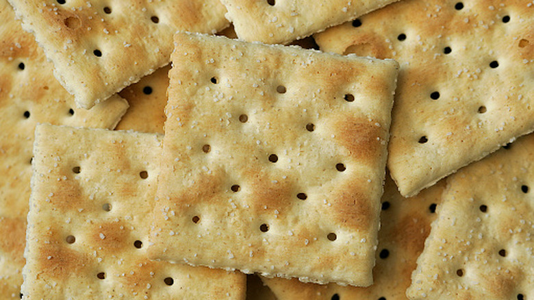 Closeup of a pile of saltine crackers