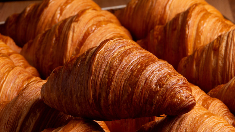 A closeup of golden-brown croissants