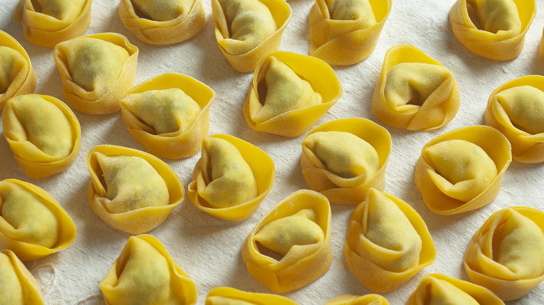 Fresh tortelloni on white cloth