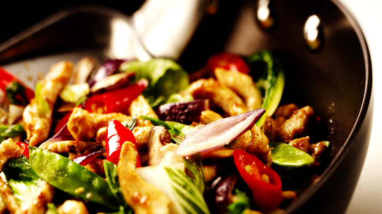 pan filled with stir-fried vegetables