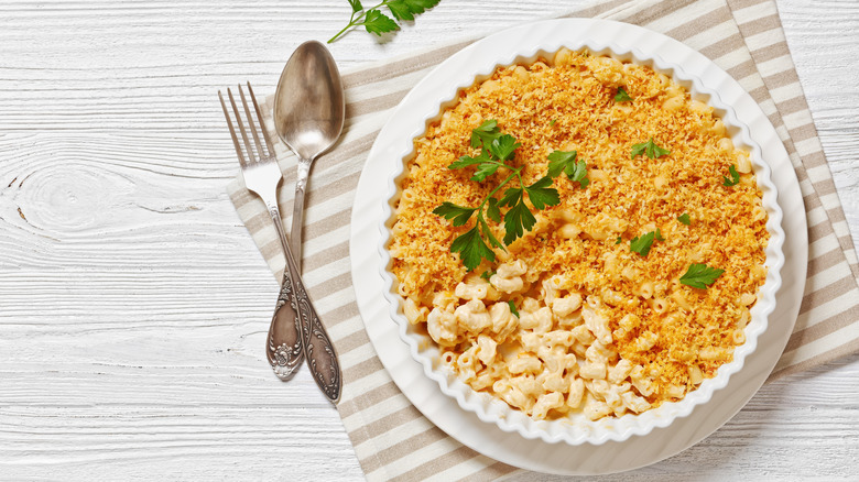 Baked mac and cheese topped with panko breadcrumbs