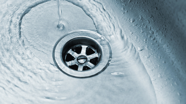 Water running down a kitchen sink drain