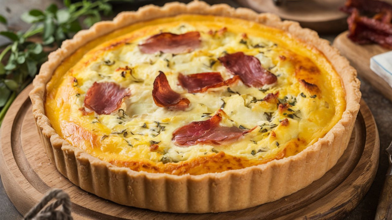 Quiche Lorraine on a wooden plate