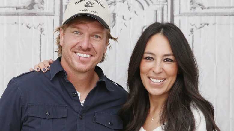 Joanna Gaines and her husband, Chip smile in close-up