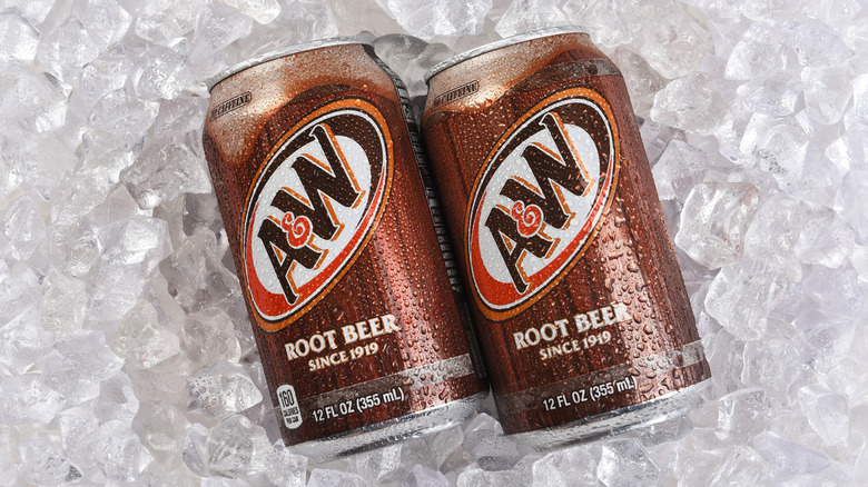 Two cans of A&W on ice