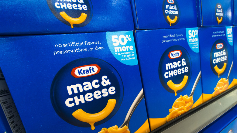 Kraft mac & cheese dinner packages on shelf at store
