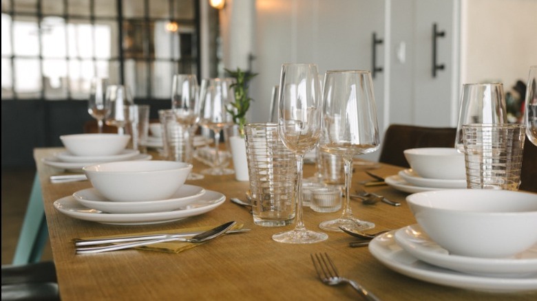 A fully set dinner table