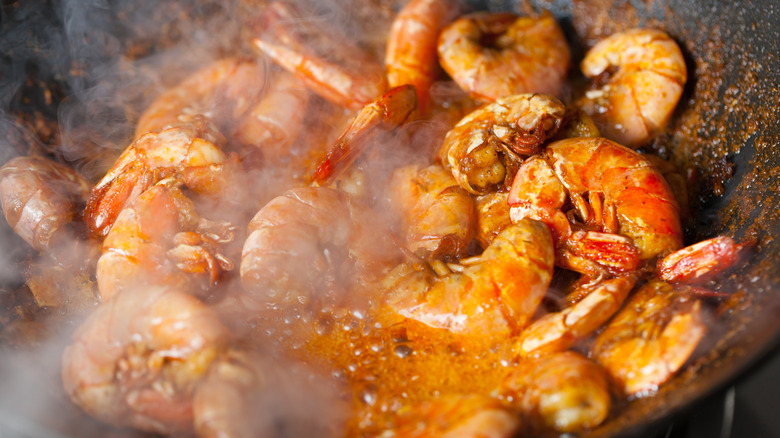 cooked shrimp in a wok