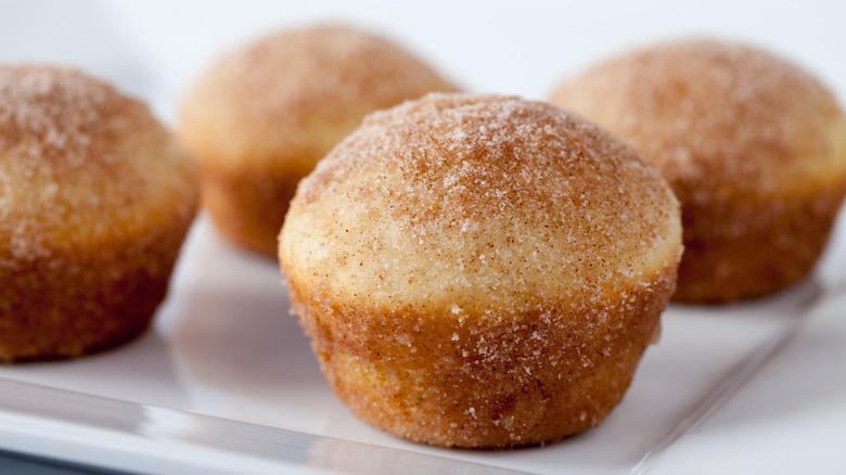 Close up of muffins coated in cinnamon sugar