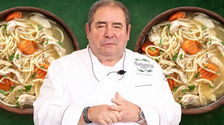 Emeril Lagasse looking slightly pained while standing in front of two floating bowls of chicken noodle soup