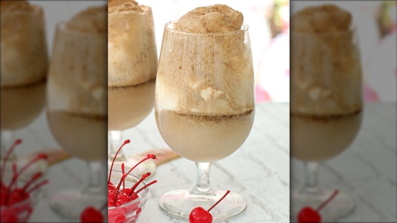 Frozen brown soda drinks in stemmed glasses