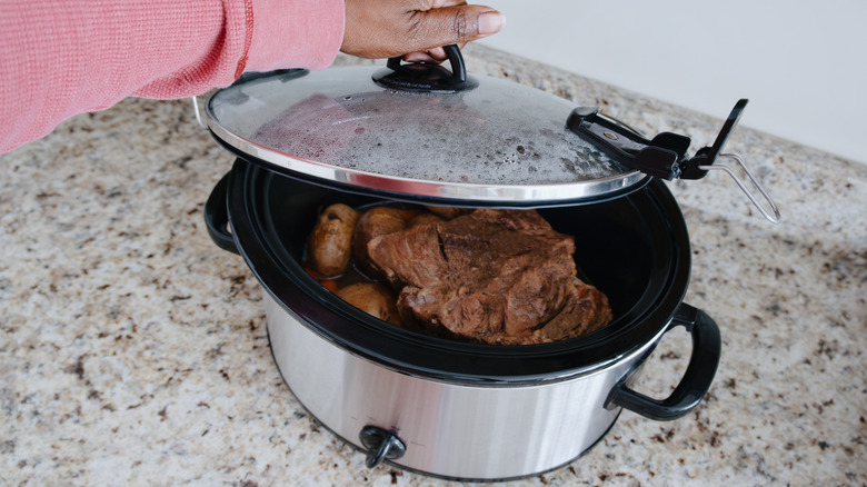 Meat inside a slow cooker