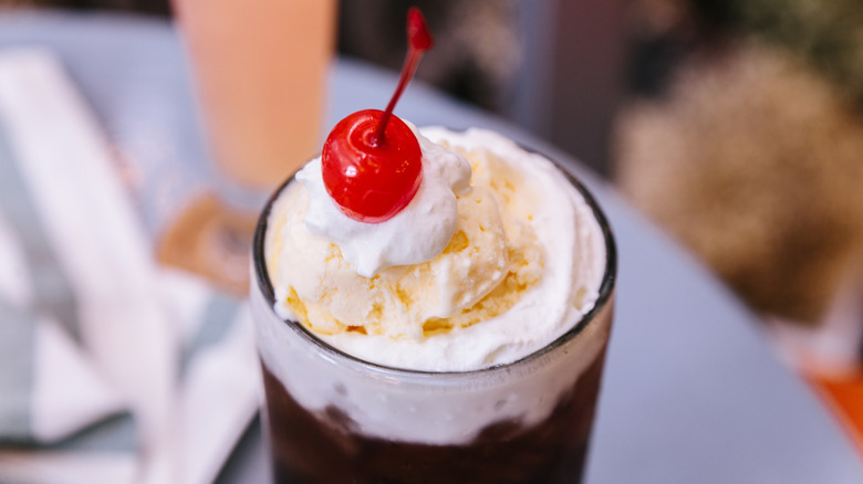 Cola cherry float in a glass