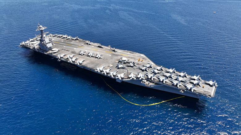 Arial photo of US aircraft carrier in ocean