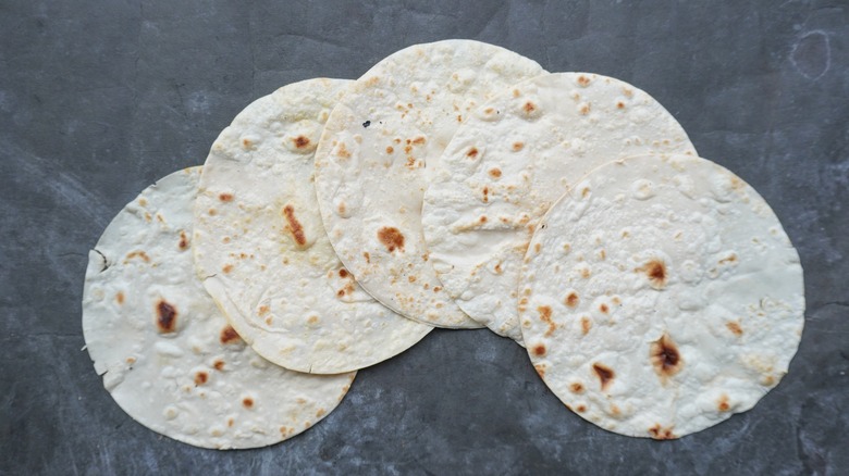 Flour tortillas on table