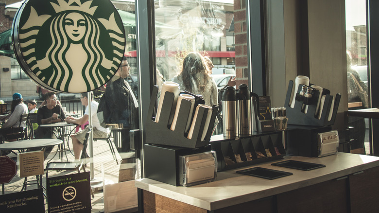 A clean condiment bar at a Starbucks in Canada.