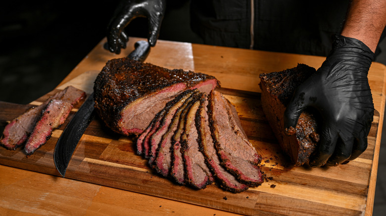 Texas-style barbecue brisket on wooden cutting board