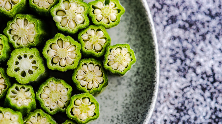cut okra on a plate