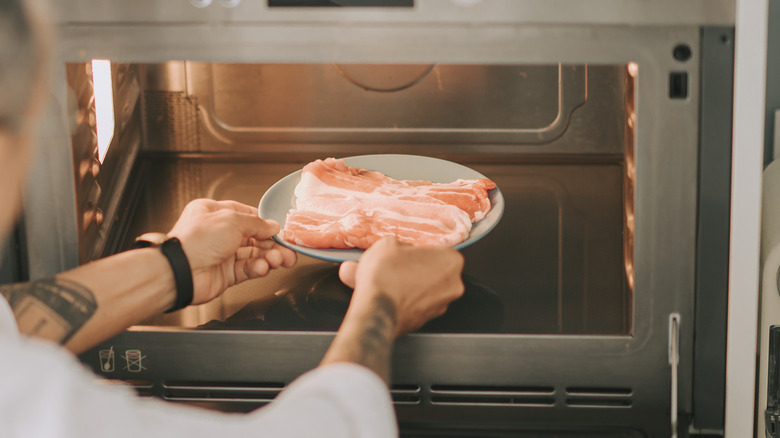 rotating frozen bacon in microwave