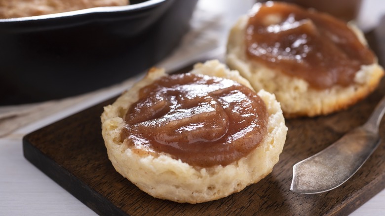 Apple butter spread on biscuits