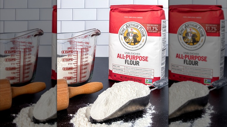 King Arthur flour on a counter with measuring cups