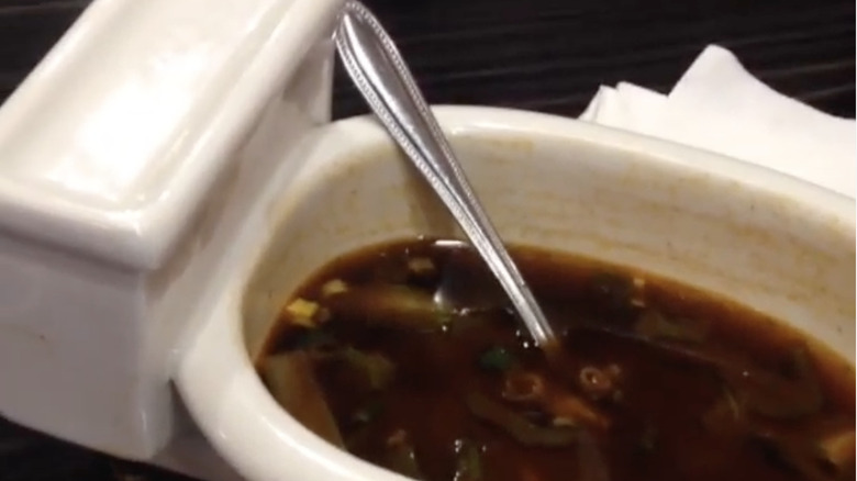 Bowl of curry in toilet bowl at Magic Restroom Café