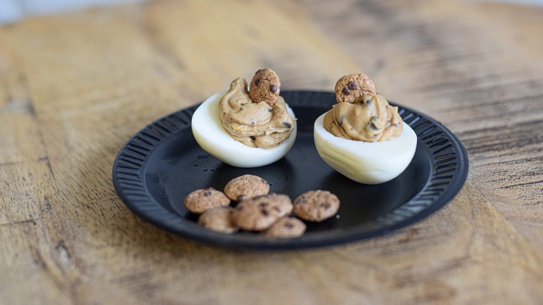 Plate of chocolate chip cookie dough deviled eggs on a table