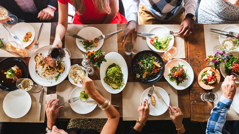 Group of people dining together at a restaurant