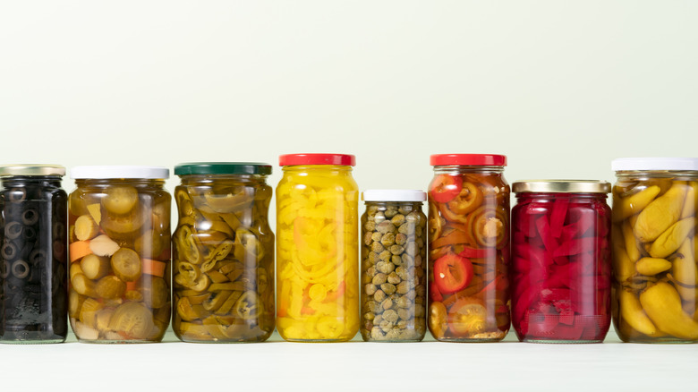 Assorted pickled peppers and vegetables