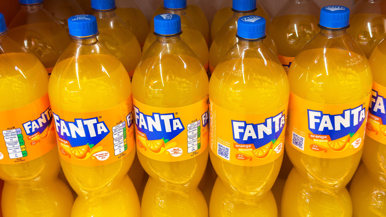 Multiple orange Fanta bottles