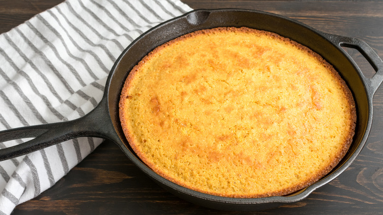 fresh cornbread cooked in cast iron skillet